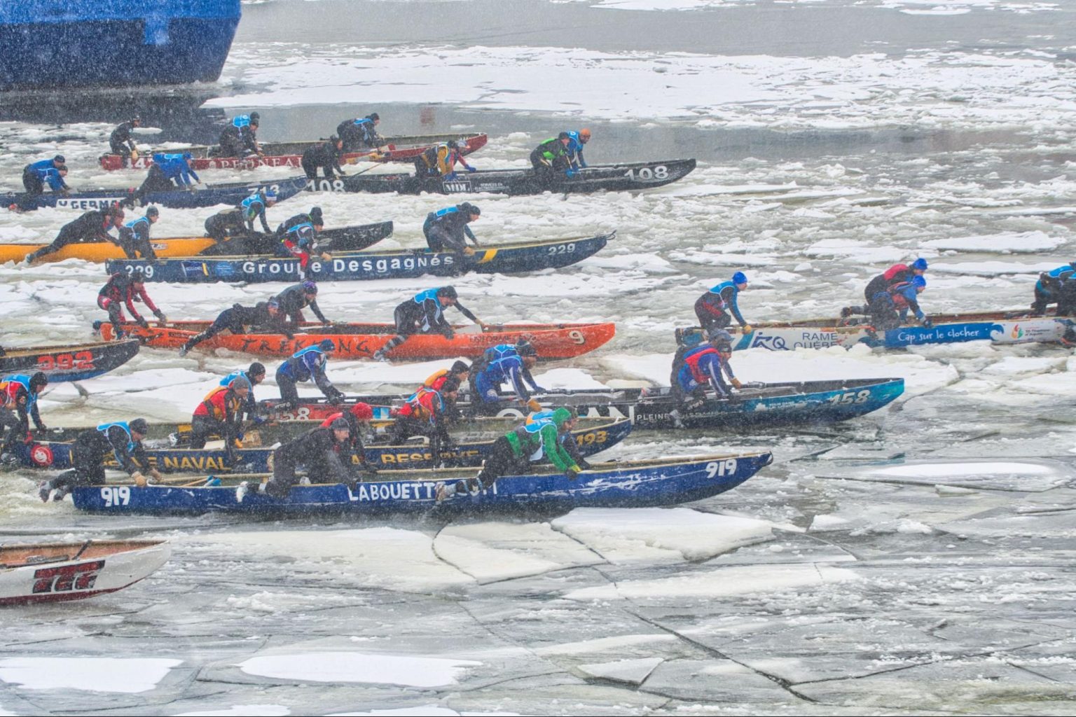 Ice canoe racers brave strong tides, slush and giant ice floes The